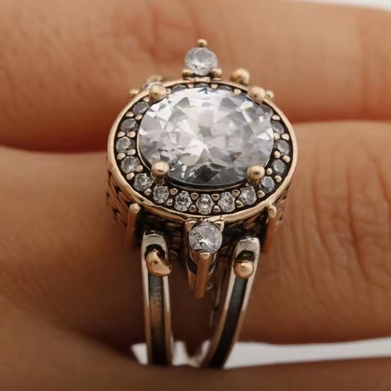 Oval Crystal Halo Ring with Split Gold-Tone Band