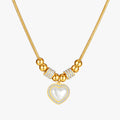 Ketting met harthanger, zirkoonstenen en parels