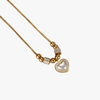 Ketting met harthanger, zirkoonstenen en parels