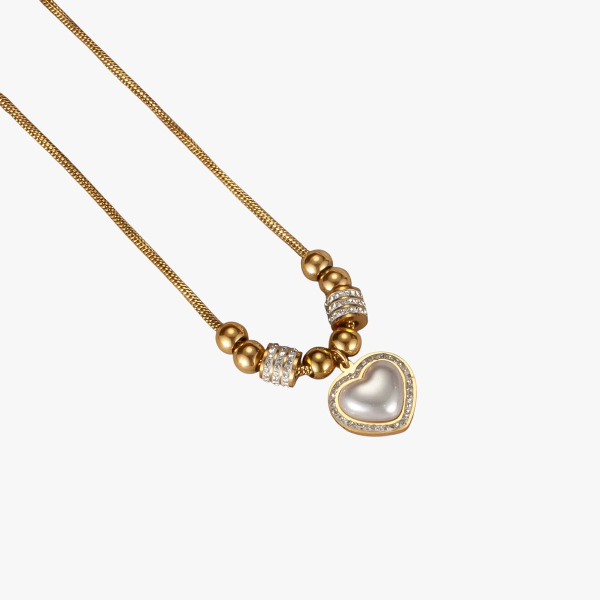Ketting met harthanger, zirkoonstenen en parels