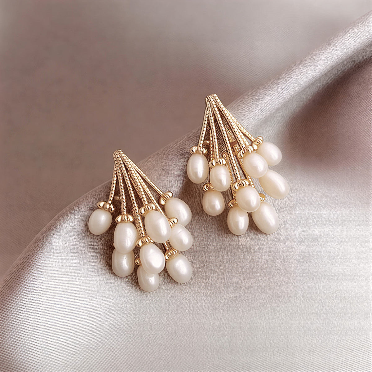 Oorhangers met cascade van parelclusters