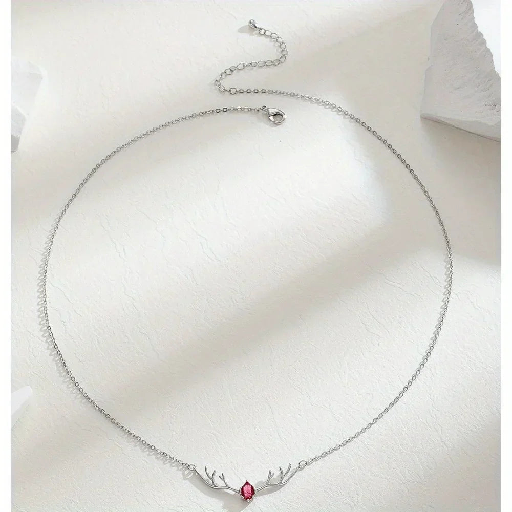 Hertengeweiketting met hartbedel