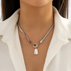 Ketting met één parelhanger, goudkleurige schakel