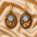 Moonstone Oval Earrings with Leaf Frame