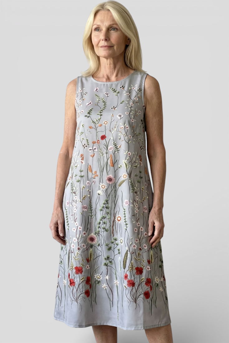 Mouwloze jurk met bloemenborduursel en losse bohovorm