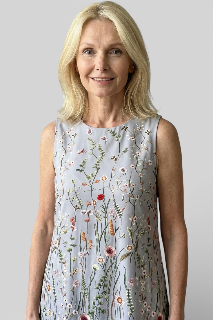 Mouwloze jurk met bloemenborduursel en losse bohovorm