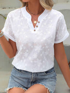 Blouse met bloemenborduursel, V-hals en knoopdetail