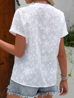 Blouse met bloemenborduursel, V-hals en knoopdetail
