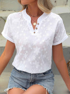Blouse met bloemenborduursel, V-hals en knoopdetail