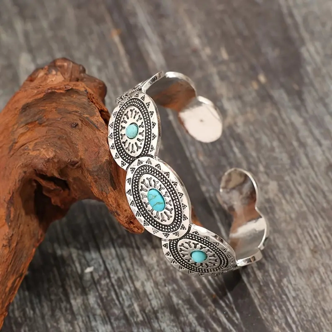 Silver-Tone Bracelet with a Trail of Blue Stones