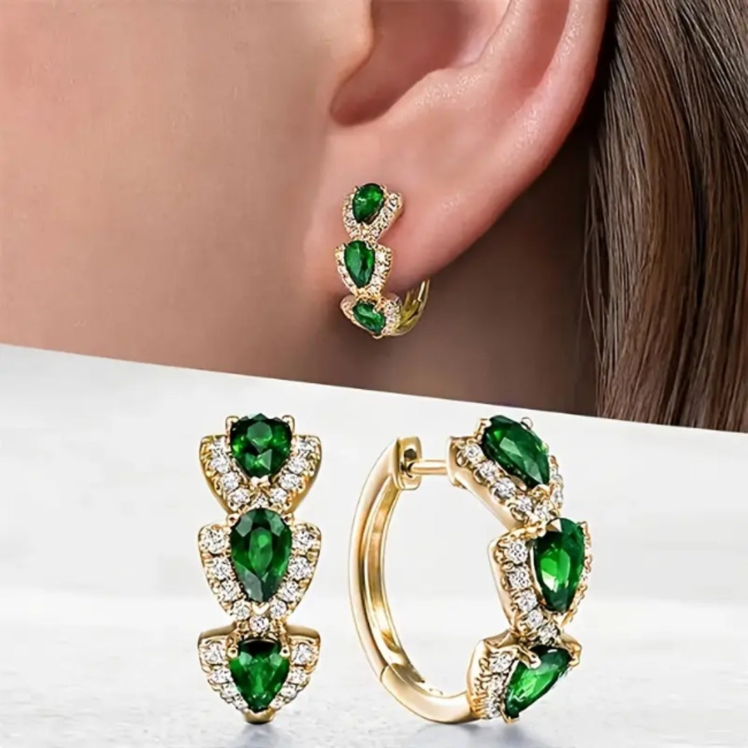 Goudkleurige oorringen met groen kristal