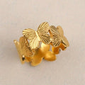 Goudkleurige bandring met vlindercluster