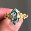 Goudkleurige ring met groene ovale zirkonia