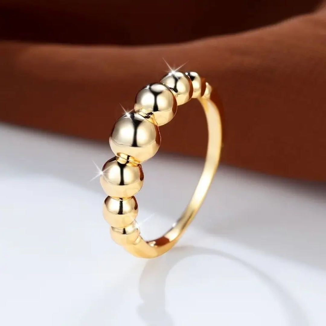 Goudkleurige kralenring