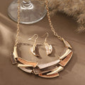 Geometrische set van ketting en oorbellen met email