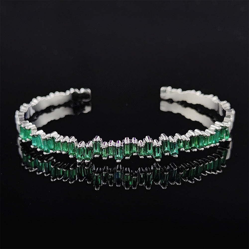 Green Stone Row Bangle in White Gold Tone