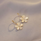 White Flower Drop Earrings in Gold Tone