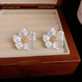 White Pearl Blossom Stud Earrings with Crystal Centre