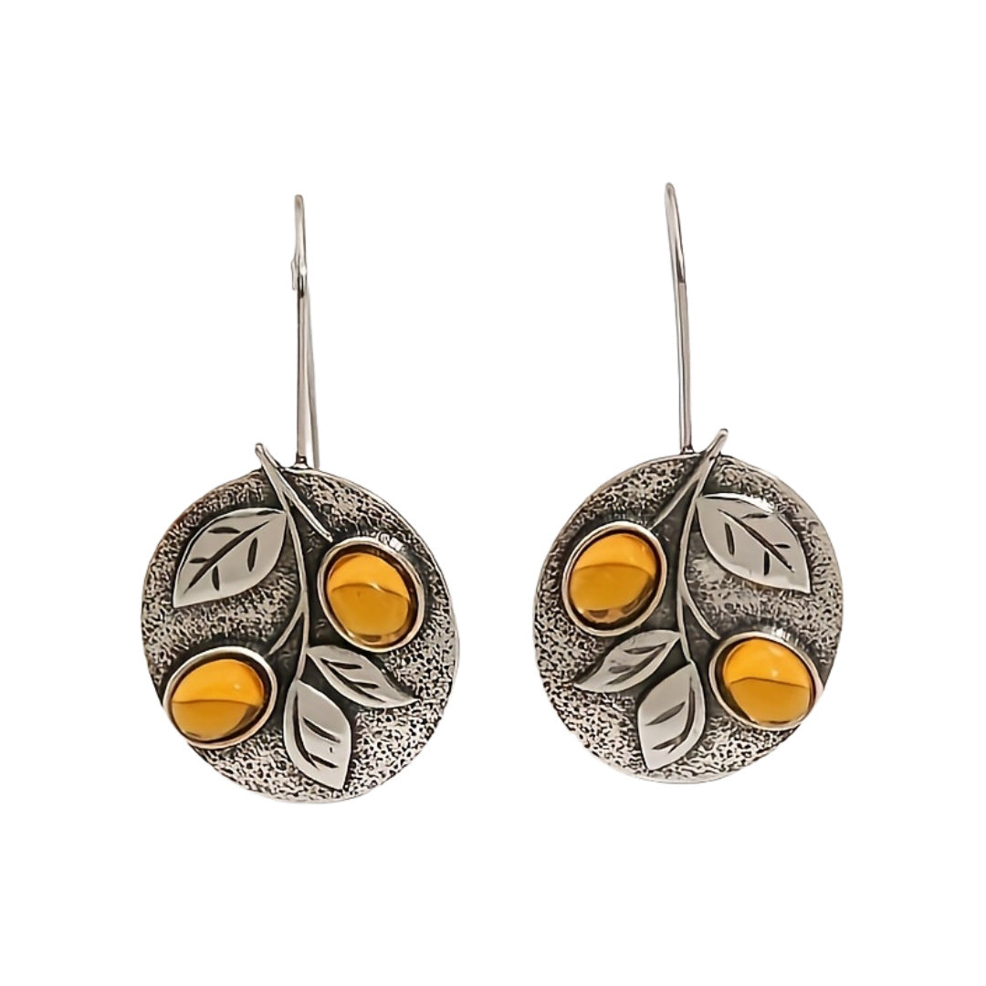 Vintage natuuroorbellen met bladschijf in amberlook