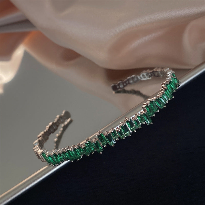 Green Stone Row Bangle in White Gold Tone