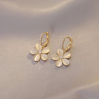 White Flower Drop Earrings in Gold Tone