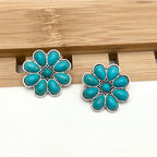 Witgoudkleurige oorknopjes met turquoise bloemblaadjes