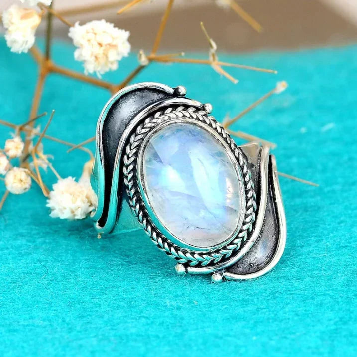 Oval Moonstone-Look Ring with Swirl Silver-Tone Setting