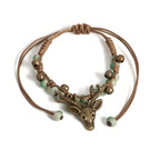 Ambachtelijke bedelarmband met keramisch hertje