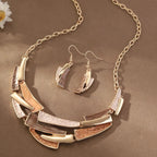Geometrische set van ketting en oorbellen met email