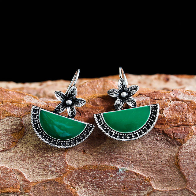 Vintage groene en zilverkleurige bloemoorbellen