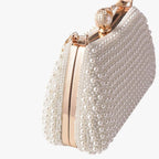 Avondtasje met parels, metalen handvat en ketting