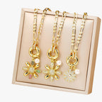 Ketting met bloemhanger en blauwe zirkoniastenen