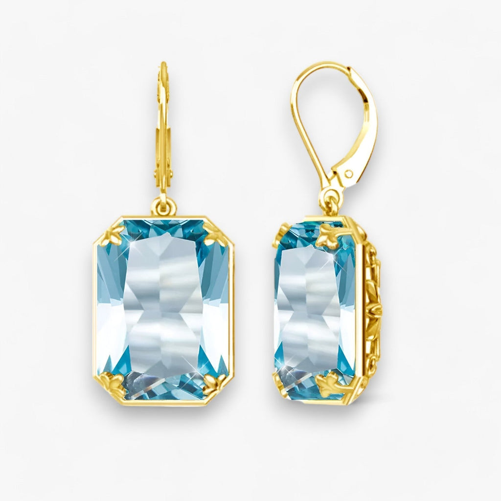 Oorhangers met blauwe steen in goud- en zilverkleur