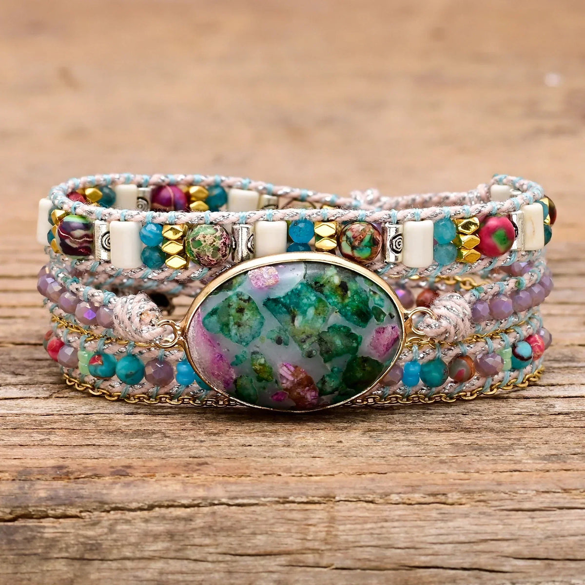 Kralenarmband van blauw calciet en agaat in regenboogkleuren