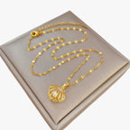 Retro ketting met parelmoer en pareldetail