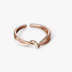Sterling zilveren ring met knoop en kruis