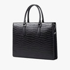 High-Capacity Black Leather Travel Bag with Laptop Compartment