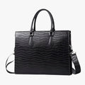 High-Capacity Black Leather Travel Bag with Laptop Compartment