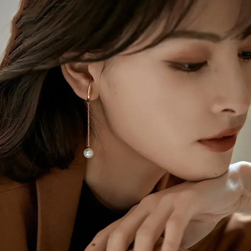 Organische earcuff met parel