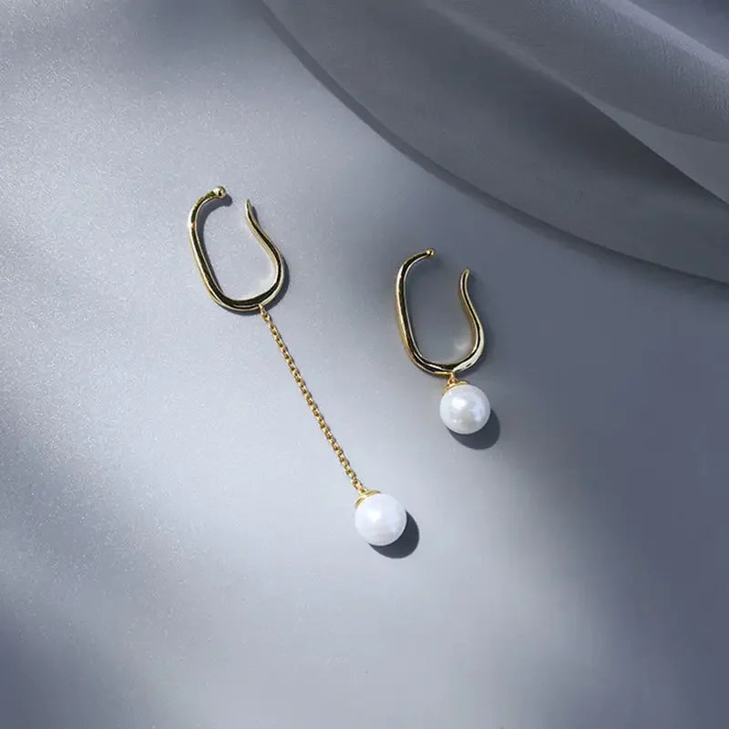 Organische earcuff met parel