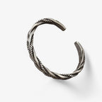 Gedraaide geweven armband in zilverkleur