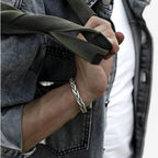 Gedraaide geweven armband in zilverkleur