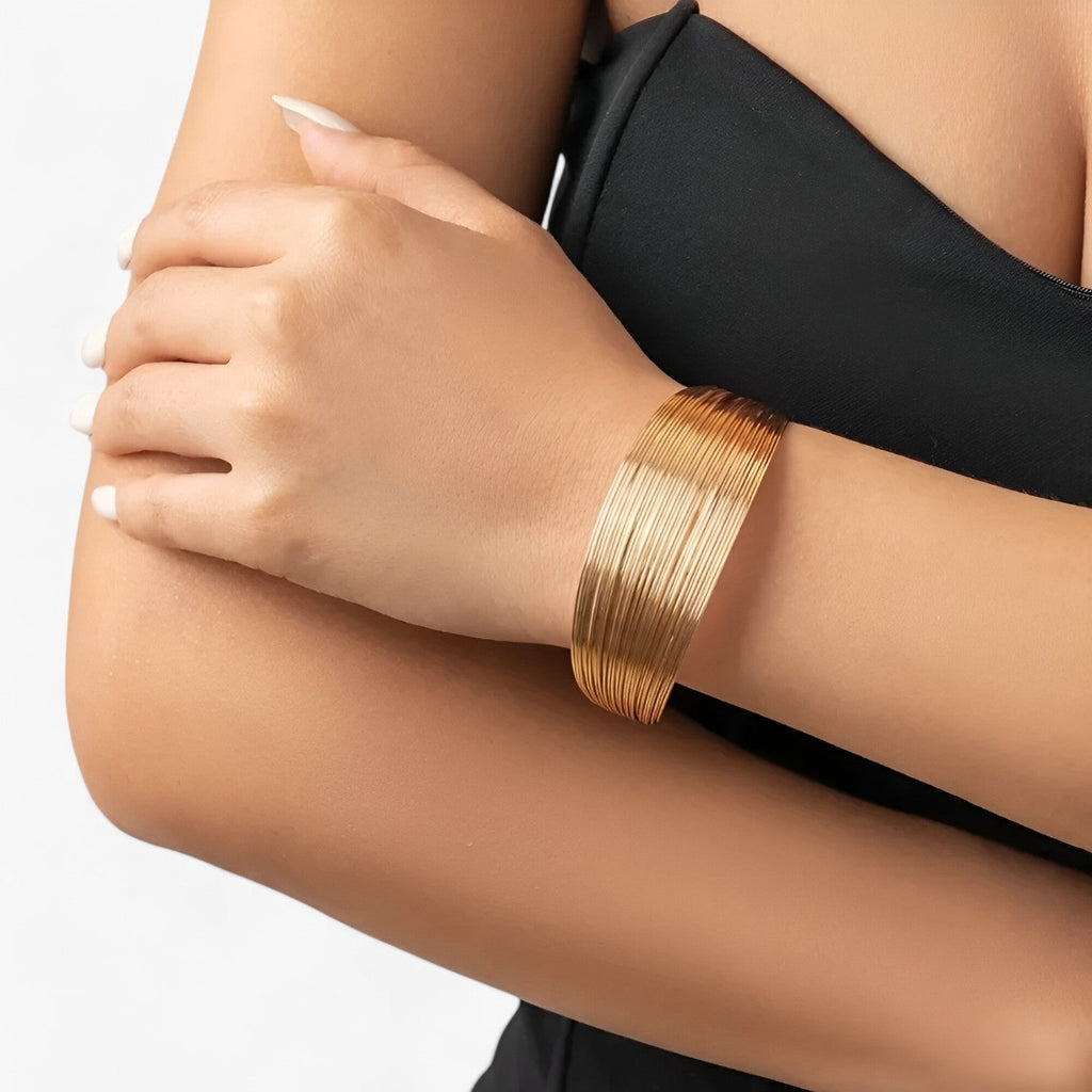 Gelaagde bangle in vintage goudkleur