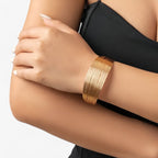 Gelaagde bangle in vintage goudkleur