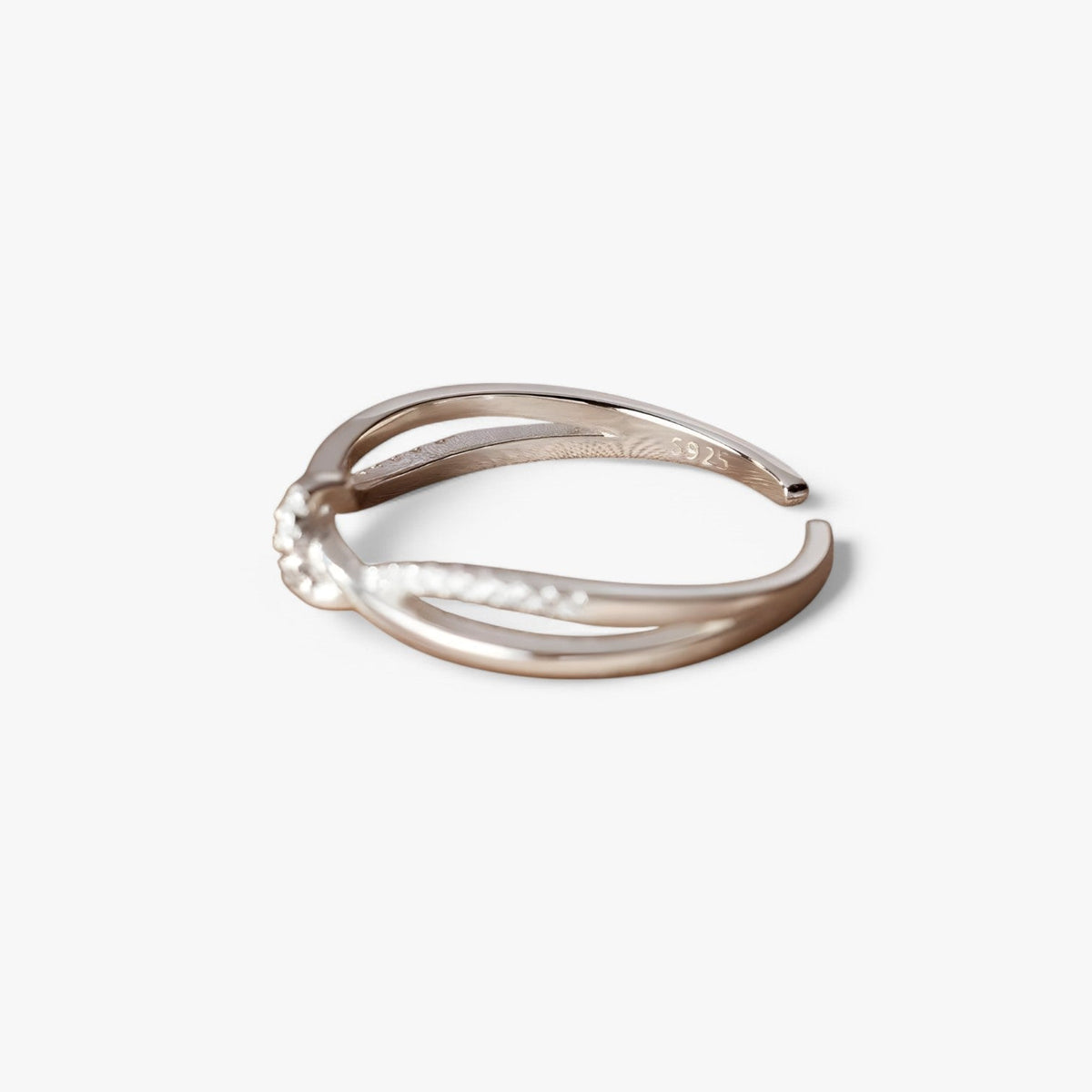 Sterling zilveren ring met knoop en kruis
