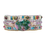 Kralenarmband van blauw calciet en agaat in regenboogkleuren