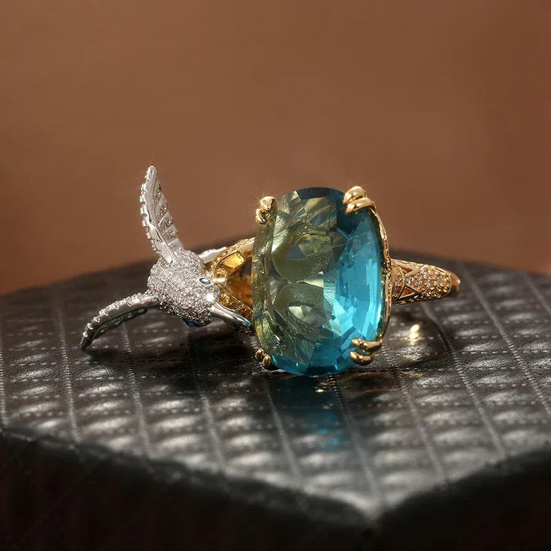 Adjustable 14K Gold-Plated Hummingbird Ring with Aquamarine-Colour Stone