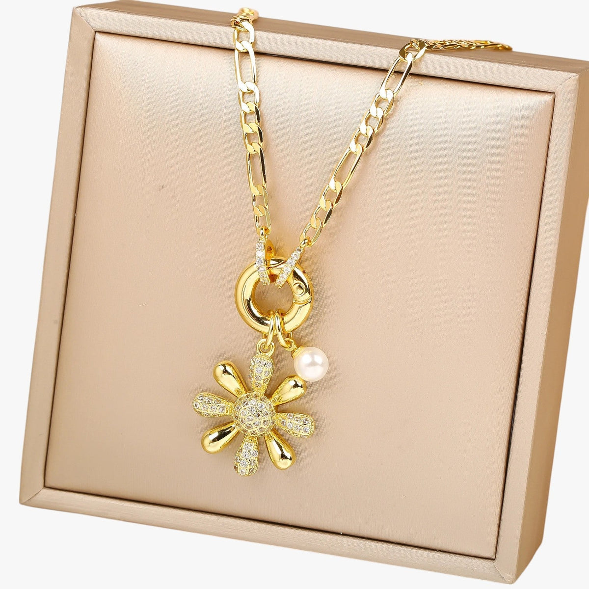 Ketting met bloemhanger en blauwe zirkoniastenen