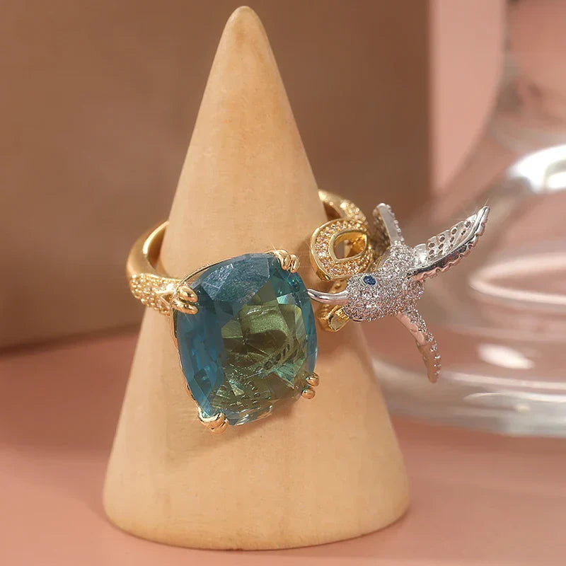 Adjustable 14K Gold-Plated Hummingbird Ring with Aquamarine-Colour Stone