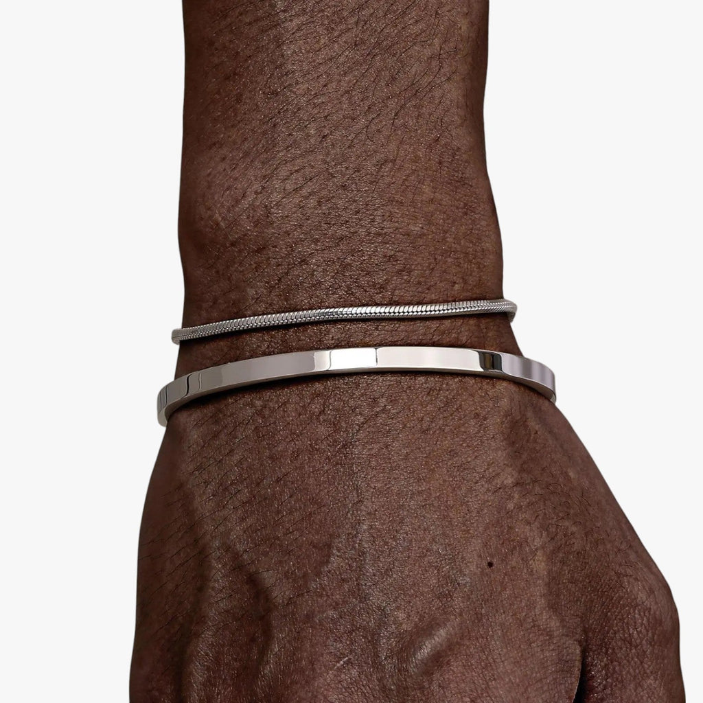 Set stalen schakelarmbanden met mat zwarte details